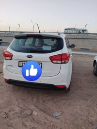 كيا كارنز خليجي 2014 محرك 2000 دوش مكفول وگير ايضا 7 راكب تبريد قطعتين...