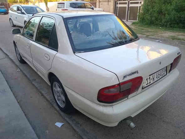 السلام عليكم للبيع بروتون ويرا موديل 2004 كير اتوماتك باسمي الرقم الدولي هزه جديده سنويه جديده بيها قطع صبغ بدون تبديل بدون اي ضربه مجرد شخوط بدون تحميل معجون وصبغ درجه اولى*********** كير ومحرك وكهربائيات وتبريد وتدفئه كلها شغاله *********** مكان السياره بغداد العامريه السعر 55$ السياره حلوة وناعمه وبالعافيه الياخذها واحلى من الصور وتحياتي للجميع بغداد
