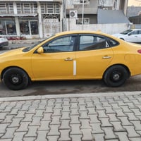 النترا 2010 • ابيض بيج • تبديل توسان/سبورتج