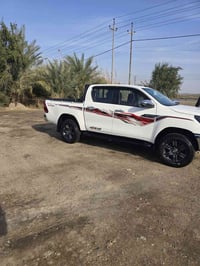 هايلوكس 2023 فور ويل رقم ربيل مواصفات ساز فول بصمه /رادار /حساسات /تبر...