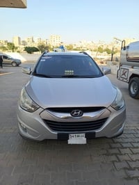 توسان ٢٠١١ • محرك جديد • فرش جلد