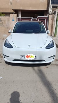 للبيع  تسلا Y وارد امريكي مو ديل 23 رقم بغداد  بسمي حادث خلفي بدون  إر...