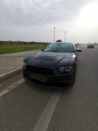 جارجر ٢٠١٢ رقم سليمانيه  بيه جامرلغ وبنيد بدون دواخل محدث والسيارة كله...