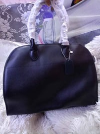 جنطة • جلد طبيعي • حجم كبير