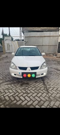 ميتسوبيشي لانسر • ٢٠١١ • كير ومحرك جدد