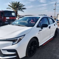 كورلا هايبرد 2025 sبلاك مزوده ومصروف عليها كلين مكفوله ماشيه 10الاف بح...