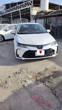 كورلا هايبرد 23   داخل احمر   بصمه  قطعتين تبريد  شاشه   سايد بريك دكم...