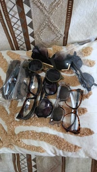 ١٢ نظارة • ٢ ماركة • توصيل