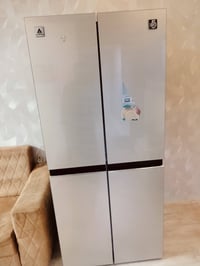 ثلاجة وطباخ للبيع 07708839396