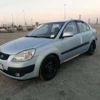 اخوان كيا ريو خليجي موديل 2008 رقم بغداد تحويل  مكينة كير صدر امامي خل...