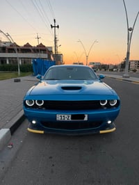 للبيع جالنجر جي تي 2023 وارد امريكي حادثها بسيط سطحي مثل ما موضح بالصو...