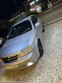 اوبتره  موديل 2008     للبيع او مراوس مصبوغه عام جمالية صدر امامي جديد...