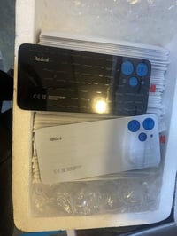 ضهر ريدمي 12 4g العدد 85 قطعه نص لون ابيض ونص اسود   ابيع فقط جمله الك...