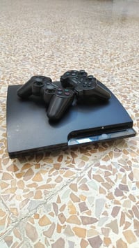 PS3 Slim • مهكر • 2 جوستك