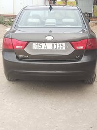 اوبتيما 2010 أمريكي ضرره قطعه وحده جاملغ الخلفي بس السعر 110 وبيه مجال...