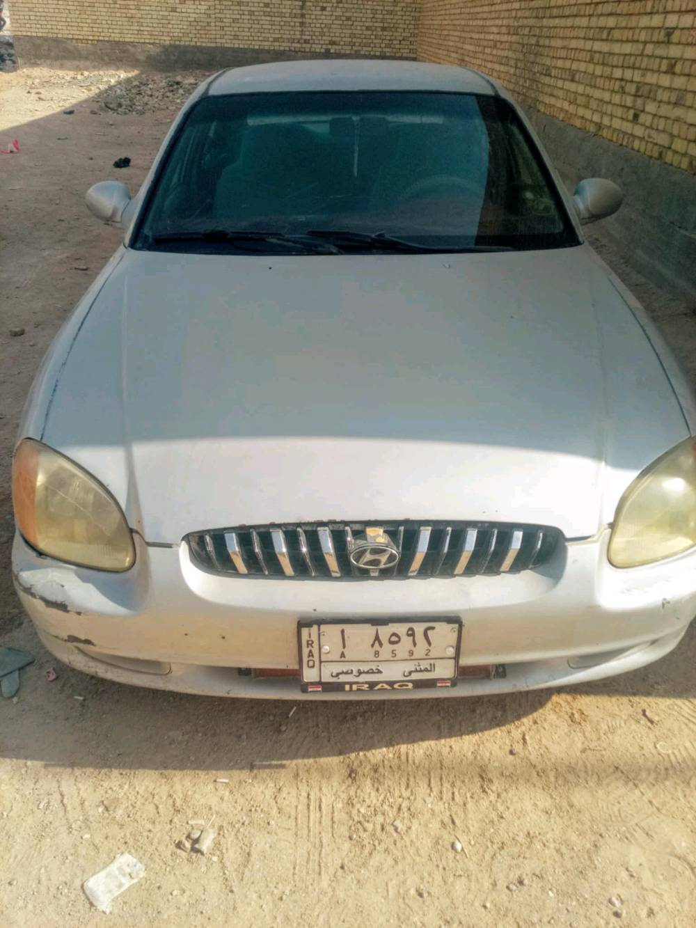 سوناتا للبيع موديل مثنى٢٠٠٠بدون صبغ مكينة بيها خيط بخار تخم تاير حدادية بيها كتاب من الكمارك معنون إلى المنطقة الجنوبية سنة ٢٦ معاملة كاملة من السماوة وراعيها الشرعي ابو السنوية مااندلة داخلة عن طريق طريبيل بدون قرص السيارة أصولية مكان السيارة غماس وإذا اكو مراوس  بس رقم انكليزي