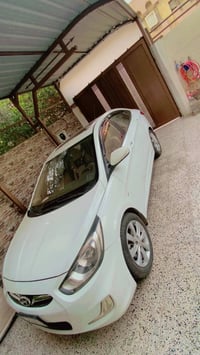 اكسنت2013 مكفولة مابيها لاصبغ ولاضرر اللون ابيض  سقف سلايت رقم نينوى  ...