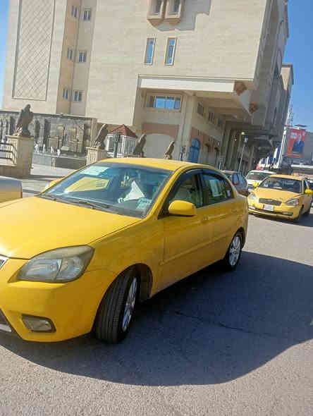 كيا ريو 2010 رقم ديالى جديد باسمي داخل اسود محرك وكير شرط وباتري جديد ضرر جاملغ بوند امريكي مبدل اصلي كاربون بانزين بيها سياره حيل حيل نضيفه ربع ما تصرف عليها ويل كب برايد طخم تايه جديد السعر 95 وبيها مجال قليل/*********** /***********
