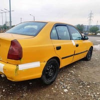 سياره اكسنت فيرنا موديل 2000 رقم بغداد للبيع  محرك لا صرف لا بخار  كهر...