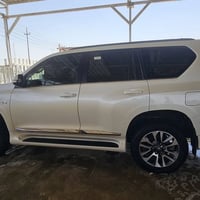 برادو موديل ٢٠٢٣ رقم بغداد دولي موجوده بديوانيه مواصفات VX المواصفات م...