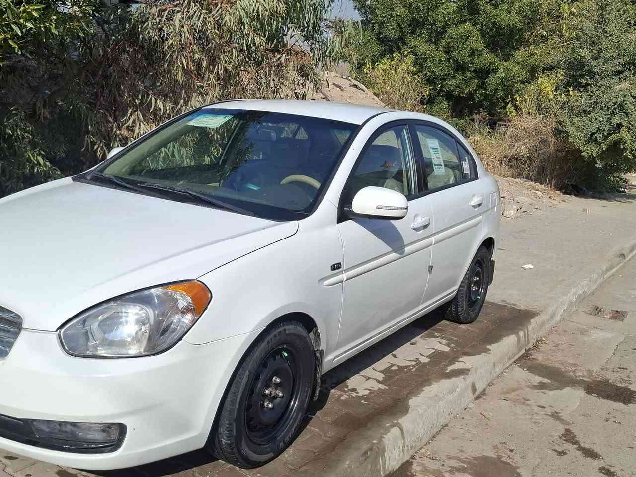 السلام عليكم اكسنت موديل ١١  خليجي مكينه ١٦٠٠ كير تبريد كهربائيات مكفولات بدون تبديل او ضربه غرفه جديده كلش اربعه جام كهرباء اشاير بلمري حساس خلفي شاشه كامره  رقم بغداد بيها قطعتين صبغ فقط عارضها ٩٣ وبيها مجال مكاني بغداد جسر ديالئ رقمي ***********
