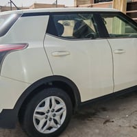 سانك يونك تيفولي ٢٠٢٢ لون ابيض ماشية ٧٦ الف رقم نينوى مواصفات نص فول م...