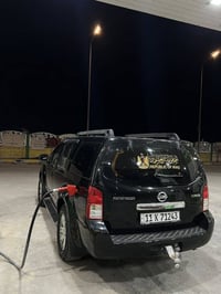 نيسان باثفندر 2012 بيه حادث لون اسود سياره فول واحد على واحد عدا الفتح...