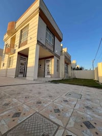 حي الطيارة • مجمّع أرض بابل • ٢٨٥م