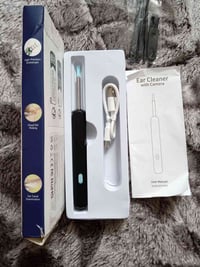 كاميرا الأذن • جهاز تنظيف الأذن