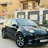 للبيع سبورتج 2021  رقم اربيل بسمي هزه وفحص جديده  بيها باب وجاملغ خلفي...