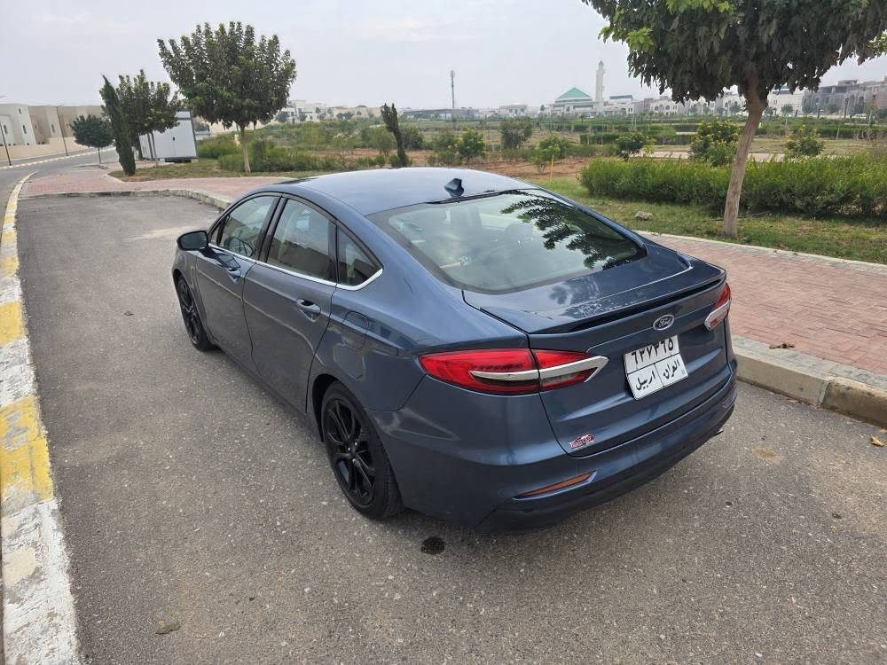 Ford Fusion 2019 SE 

 فورد فيوجن 2019

• المسافة المقطوعة : 29 الف مايل فقط ‼️ ( سيارة مال دكتورة ههه) 

المواصفات : كامل مواصفات بدون فتحة سقف فقط

 • تشغيل عن بعد
• تشغيل بصمة وبصمة ابواب 
• كاميرا خلفية 
• حساس مطر
 • اضاءه داخليه 7 الوان
• شاشه اصليه
° نظام Eco لتوفير الوقود
• هاند بريك كهرباء
° وسائد هوائيه بلمقعد
• مثبت سرعة تفاعلي
 • اناره ترحيبيه
  • نظام صوتي sony
• غمازات عالمري 
• اضوية زينون اصلي
° ايرباك عدد 8 
° نظام الملاحة gbs
• اجهزة سلامه عامه SRS + ABS
• مرآة وسطية ذات خاصية تعتيمية
 • مانع انزلاق
 • كود أبواب لفتح السيارة في حالة فقدان المفتاح
 • سبويلر خلفي
 • كشافات led
• نظام اوامر صوتي
• اغلاق وفتح شبابيك عن طريق مفتاح
• شفتات ستيرين

السياره جاهزة ما تحتاج اي مصرف 
ضرر : قبغ صندوق و جاملغ خلفي + ٢ باب جهة سايق تبديل 

الضربة خارجية فقط....... السيارة  بدون ايرباك
مكان السيارة : اربيل

لمعرفة التفاصيل مراسلة الارقام

***********
*********** أربيل, العراق
