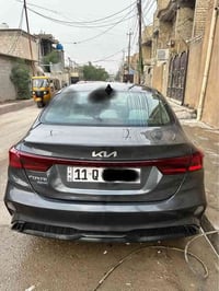 كيا فورتي 2023 رقم بغداد  مكينة 2000 دوش حادثها موضح بالصور فقط دعامية...