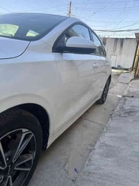 فورتي 2024 ماشية 25 mi ضربة خفيفة جاملغ الأيسر  صور الحادث موجودة  محر...