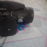 نيكون P900s • ملحقات كاملة • الكوت