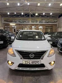 نيسان سني 2024 مانه ماشية 11 الف رقم بغداد (ضمان شركة السور) مواصفات /...