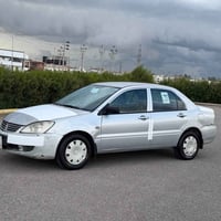 لانسر ٢٠٠٩ • مكينة قوية • ٨٠٠٠٠ كم