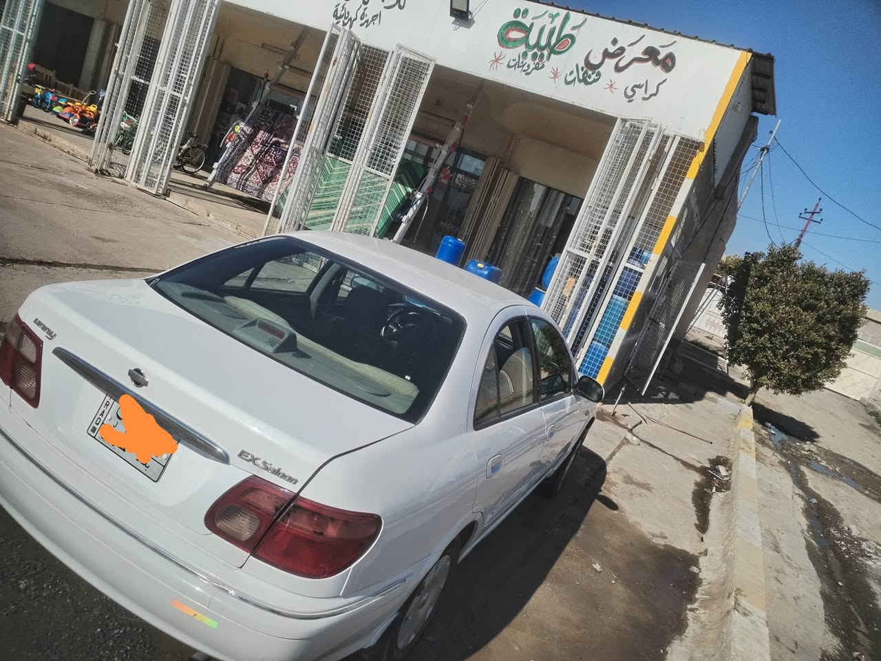 سني 2001 رقم بغداد
لون ابيض 
كير عادي 
بس جاملق صبغ قليل بل دعاميه الاماميه 
عنوان العنوان
يثرب حي القادسية 
***********
