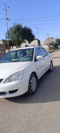 لانسر • ٢٠١١ • ماشيه ١٠٥٠٠٠