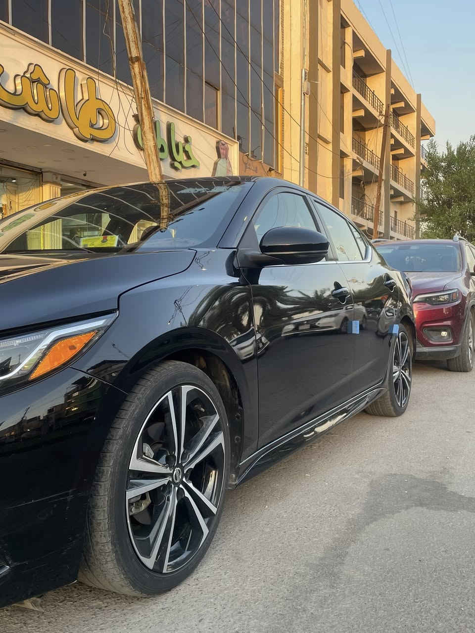 السلام عليكم نيسان سنترا SR بلاس
موديل 21

‏🇺🇸 وارد أمريكي — الحادث چاملغ خلفي وباب خلفي تبديل نفس اللون عكس السايق ✅

✨ المواصفات:

🔹 لون  ( أسود)

🔹 غرفة جلد مع تدفئة الكشنات والستيرن

🔹 سلايد روف

🔹 4 كاميرات

🔹 رادار أمامي وخلفي

🔹 نظام الوقوف الذاتي وتنبيه السائق من الاصطدام

🔹 مثبت سرعة

🔹 شاشة أبل كار بلاي

🔹 كرسي سائق كهربائي

🔹 تشغيل عن بُعد

🔹 كشاف لد مع عدسة

🔹 لد نهاري

🛣️ العداد: 70.000كم فقط

💵 السعر:155 ورقة (وبي مجال)

رقم بغداد بسمي

📍 المكان: شارع الصناعه 

📲 للاستفسار 
***********
