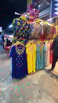 بغداد الشعلة • سوق صنعة • ملابس