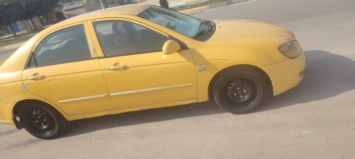 السياره سيراتو كير عادي المكينه1600 سعر58وبيهه مجال قليل المكان كربلاء الجاهز رقم الهاتف ***********
