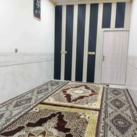 بيت للبيع • طوز خورماتو • ١٠٠متر زراعي