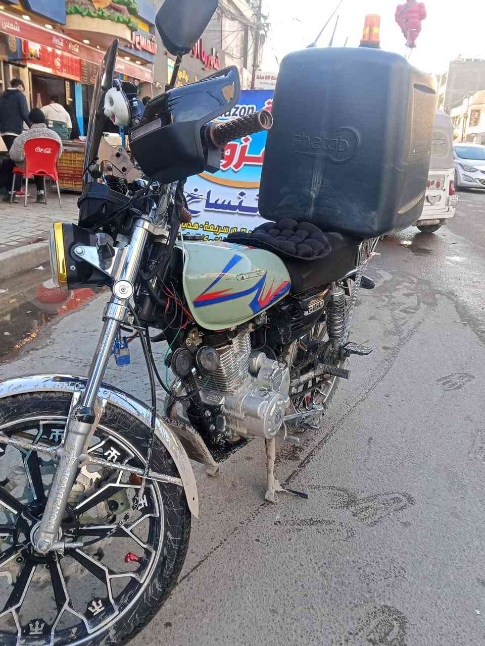 دراجه ايراني مودي خمسه وعشرين نضيفه مكفوله كفاله دراجه كلشي بيه شغال بس ماعده صندوك مو وياها ***********
