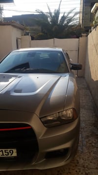 جارجر للبيع موديل 2014 فول مواصفات واحد على واحد  رقم بغداد انكليزي شر...