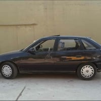 اوبل استرا موديل 92 اني الشرعي بس البوند مصبوغ وبعد مامبولش كاربون بيه...