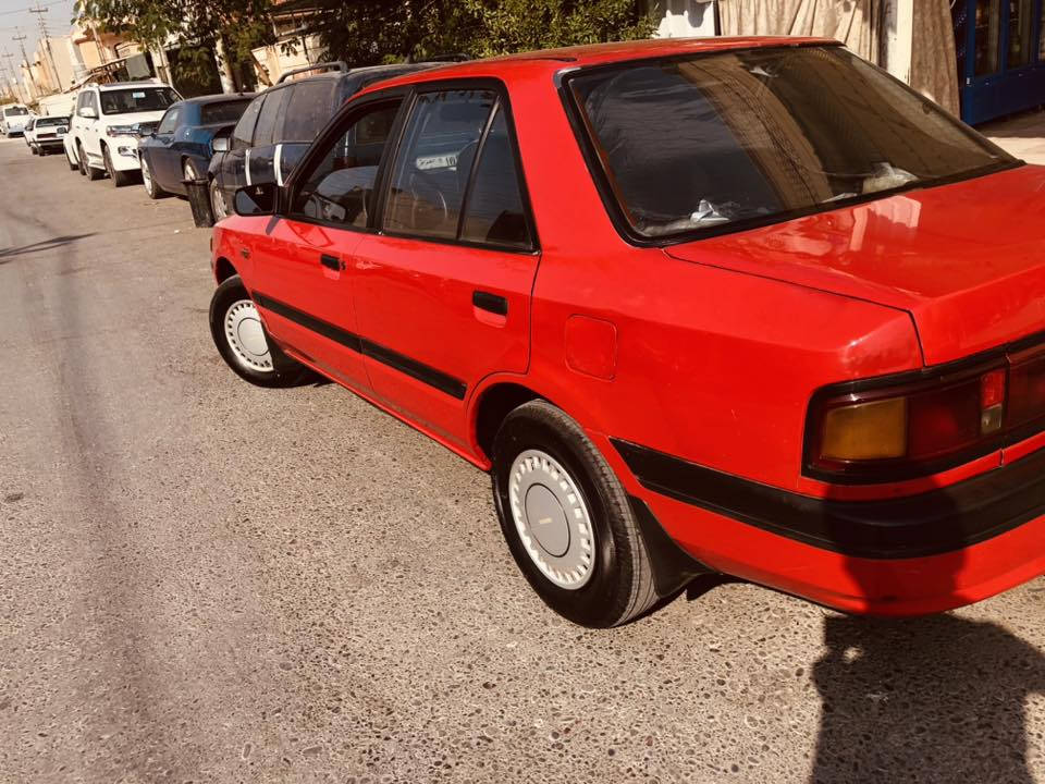 مازدا ٣٢٣ )١٩٩٠)٨وبه خ سبوغ بيلادي ***********
