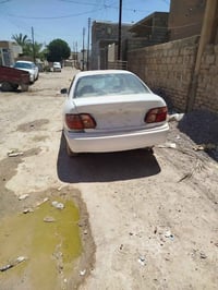 سني 2002 يابني اصلي ما محور بيها صفحه مصبوغه عام  رقم بغداد انكليزي تح...