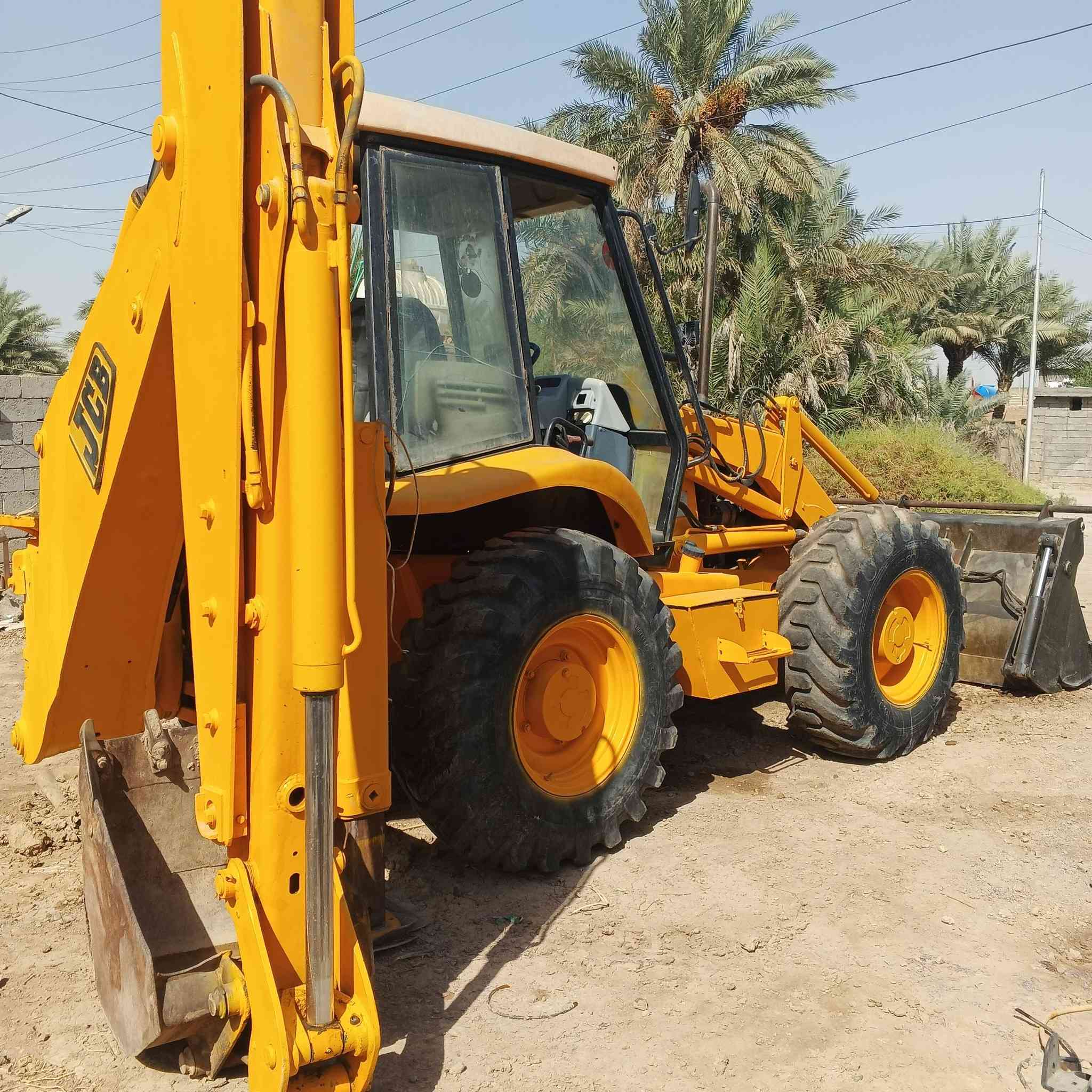 حفارة جي سي بي موديل 2000  رقم بغداد مشروع وطني لاكسر ولافطر كماشة سلات كير محرك كلة تمام مكان بغداد الجسر ***********
