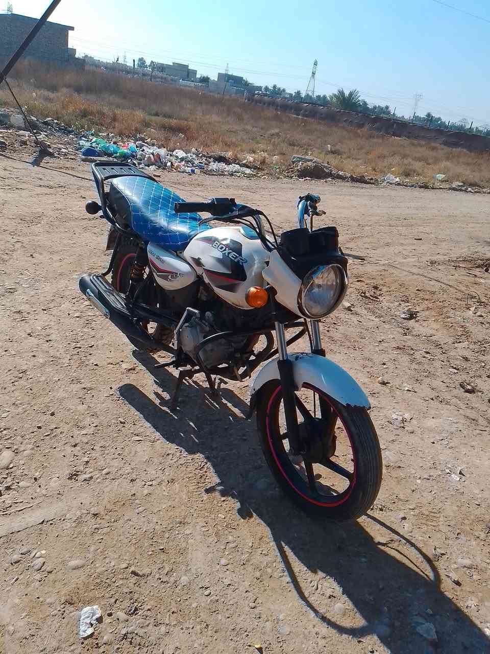 سلام عليكم دراجه بوكسر البيع موديل 2020 دراجه نضيفه خير من الله سعر ستميه وبيها مجال  الطيب بكان بغداد قرب سيطرة الشعب رقم الهاتف ***********
