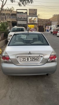 ‏ ‏ لانسر موديل 2011￼سياره خير من الله مكفوله 07700764554
